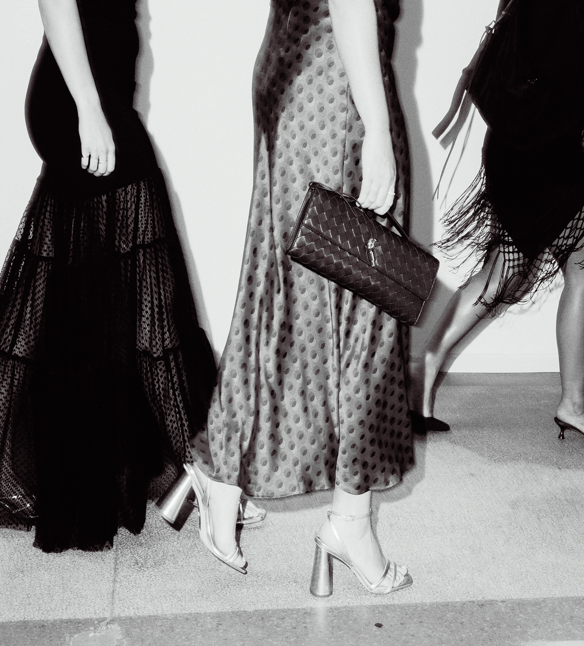 Detail of black-and-white fashion looks at Pickle's anniversary event