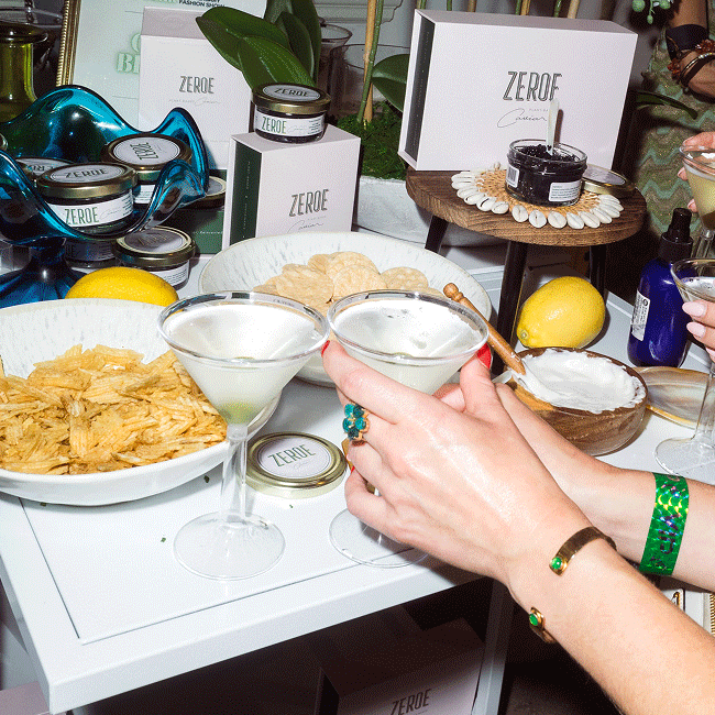 Guests sample food and drinks at Pickle's anniversary event