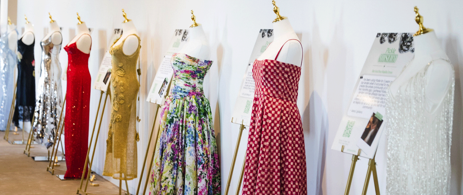 Colorful garments displayed on mannequins and racks