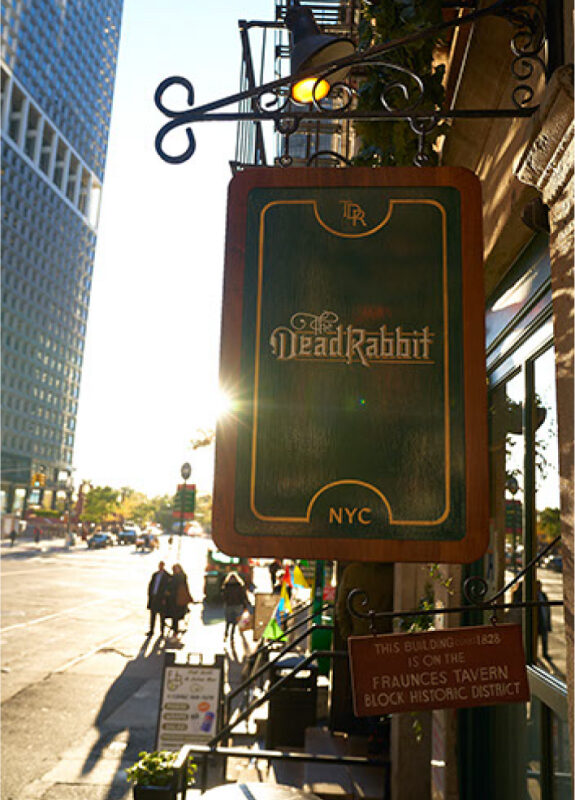 The Dead Rabbit's hanging pub sign on the Fraunces Tavern Block Historic District