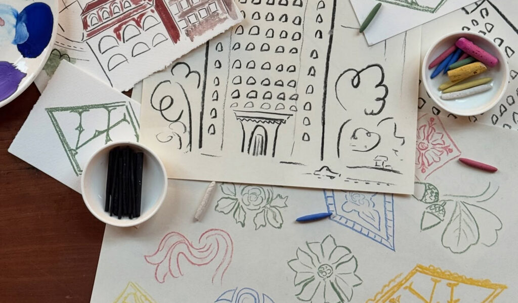 Art supplies and drawings inspired by the Woolworth Building