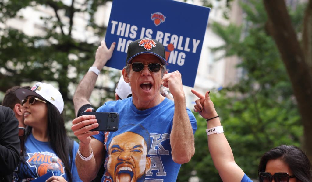 Knicks fan holds a sign during the ticker-tape parade