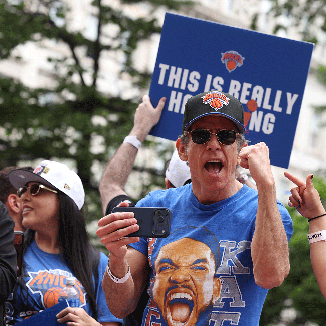 Knicks fan holds a sign during the ticker-tape parade