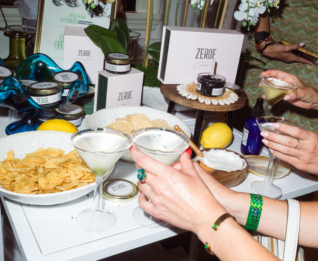 Guests sample food and drinks at Pickle's anniversary event