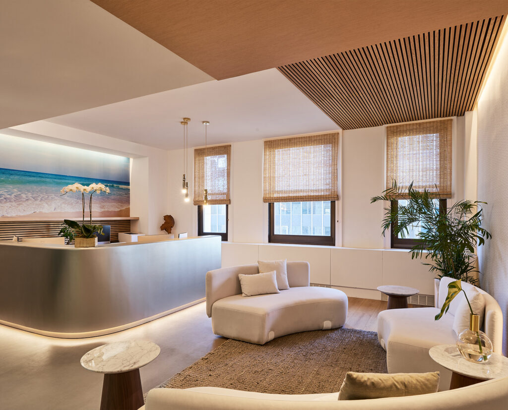 Retail suite with curved reception desk and wood ceiling
