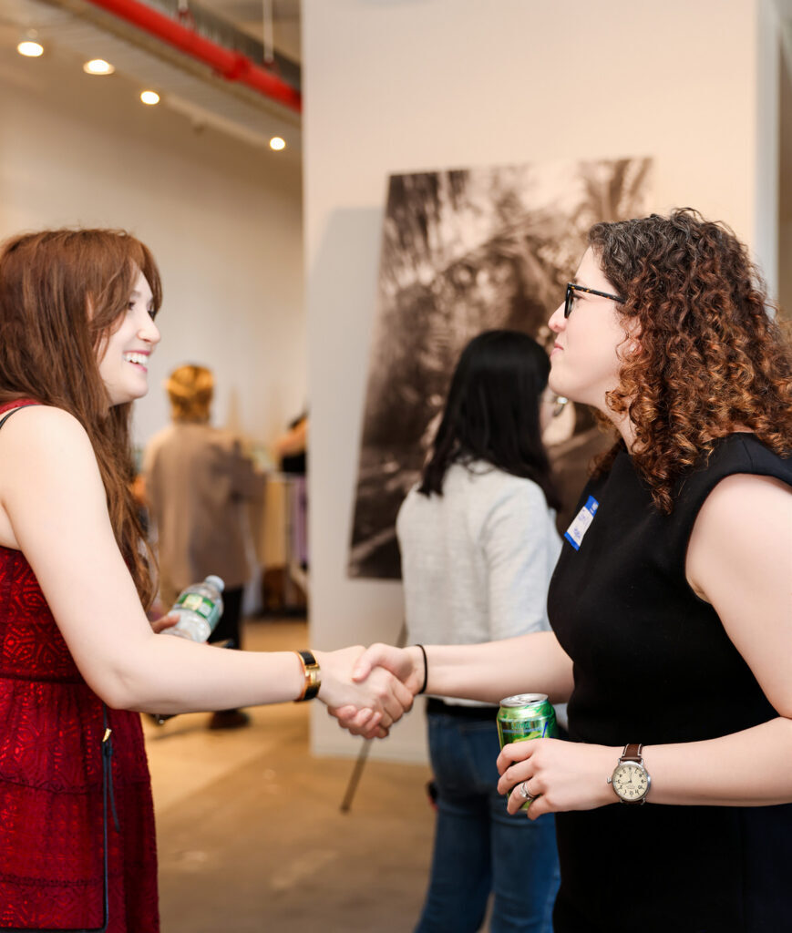 Guests greet one another at a New York Tech Week gathering
