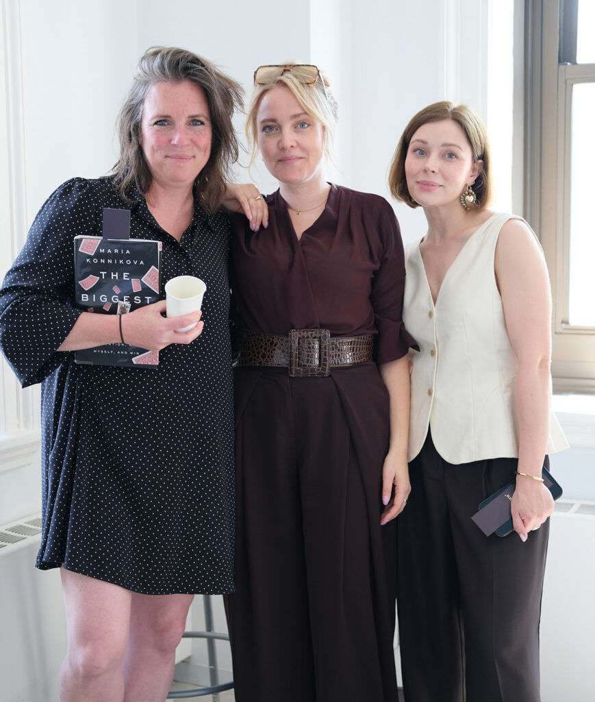 Three attendees pose together during New York Tech Week
