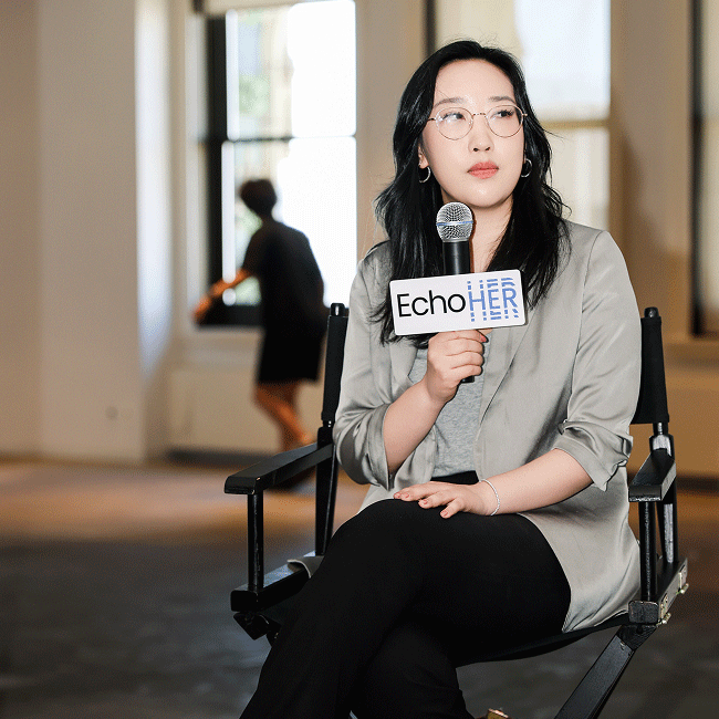 Speaker holds an EchoHer microphone during New York Tech Week