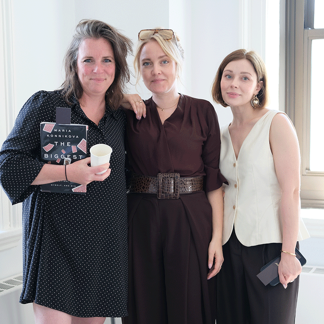 Three attendees pose together during New York Tech Week